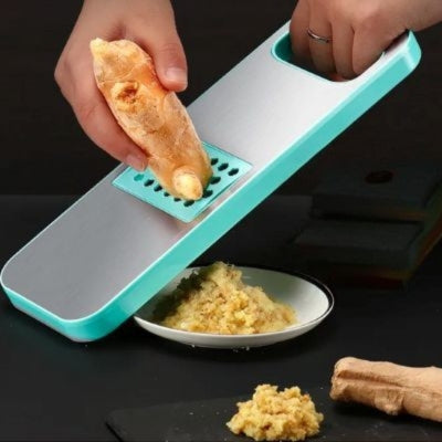mandoline japonaise poussoir ergonomique pour maximum de sécurité