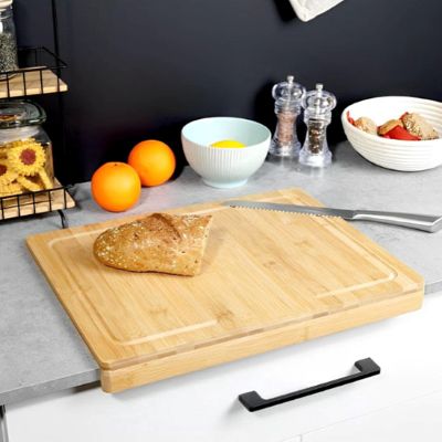 planche a decouper en bois rainure pour capturer les liquides
