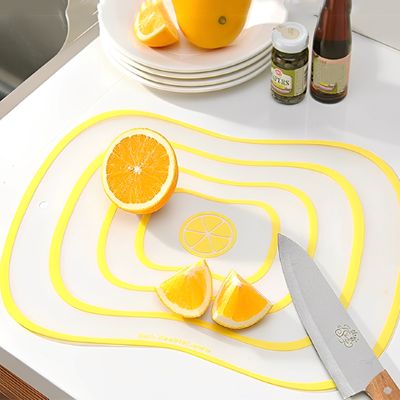 planche à découper jaune pour les fruits