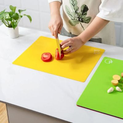 planche a decouper laver sous eau savonneuse