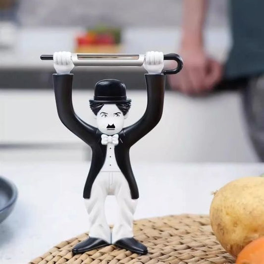 Eplucheur pommes de terre se tient debout