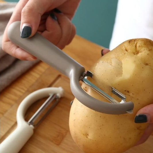 Éplucheuses à pommes de terre léger se tient bien dans la main